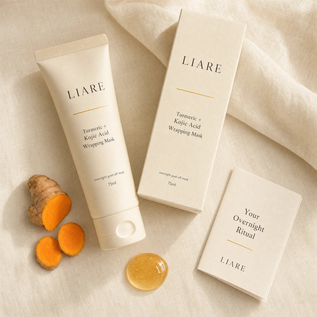 Contents of the order laid flat: two 75ml tubes of turmeric and kojic acid wrapping mask