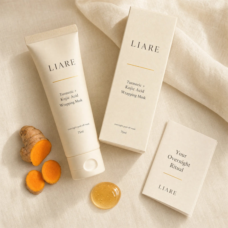 Contents of the order laid flat: two 75ml tubes of turmeric and kojic acid wrapping mask